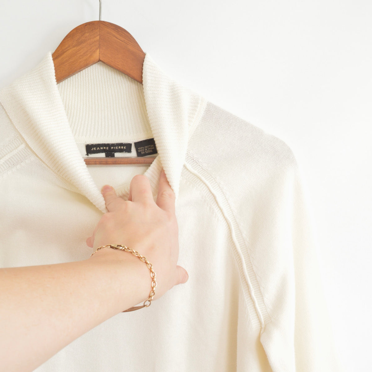 simple thin cream curved hem turtleneck sweater