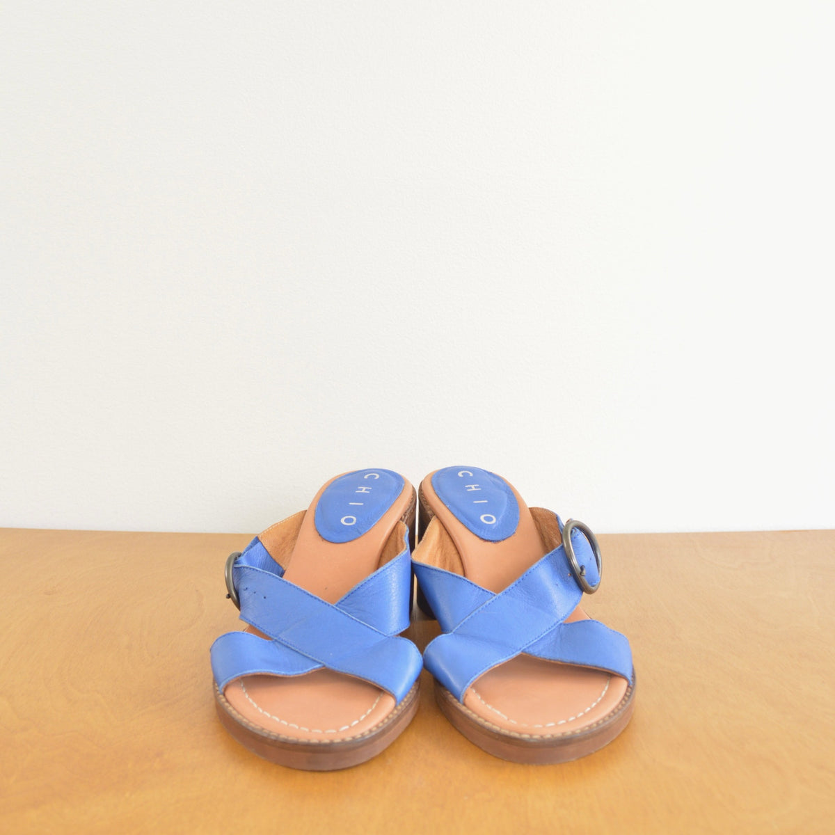 blue leather cross over block heels