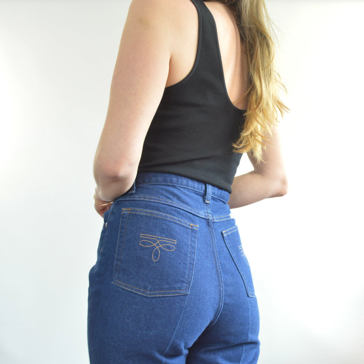dark wash cowboy style high waisted seamed straight leg sheplers denim