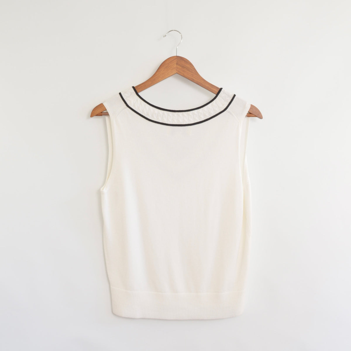 pretty white sweater knit tank with contrasting black trim