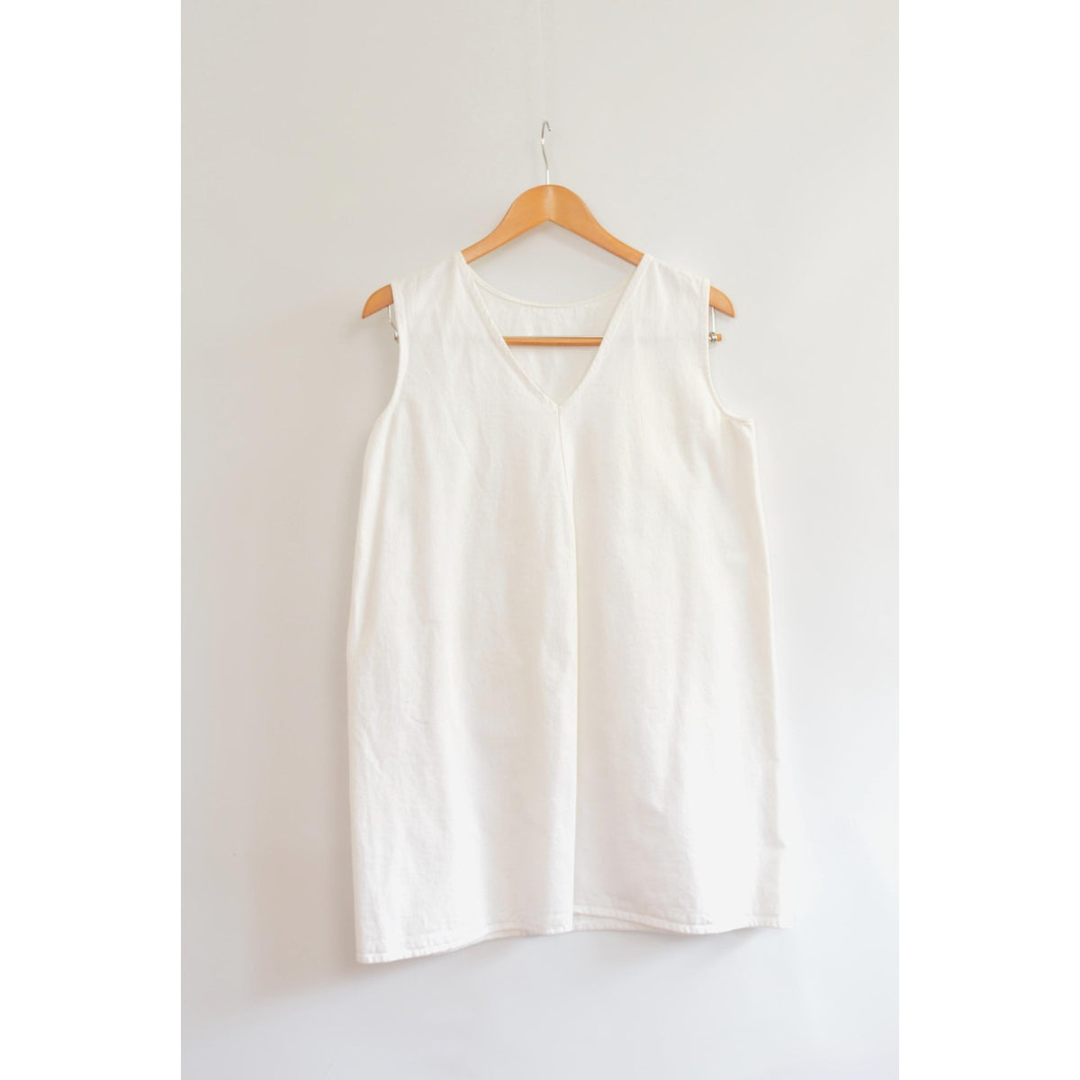 thick structured white denim mini dress