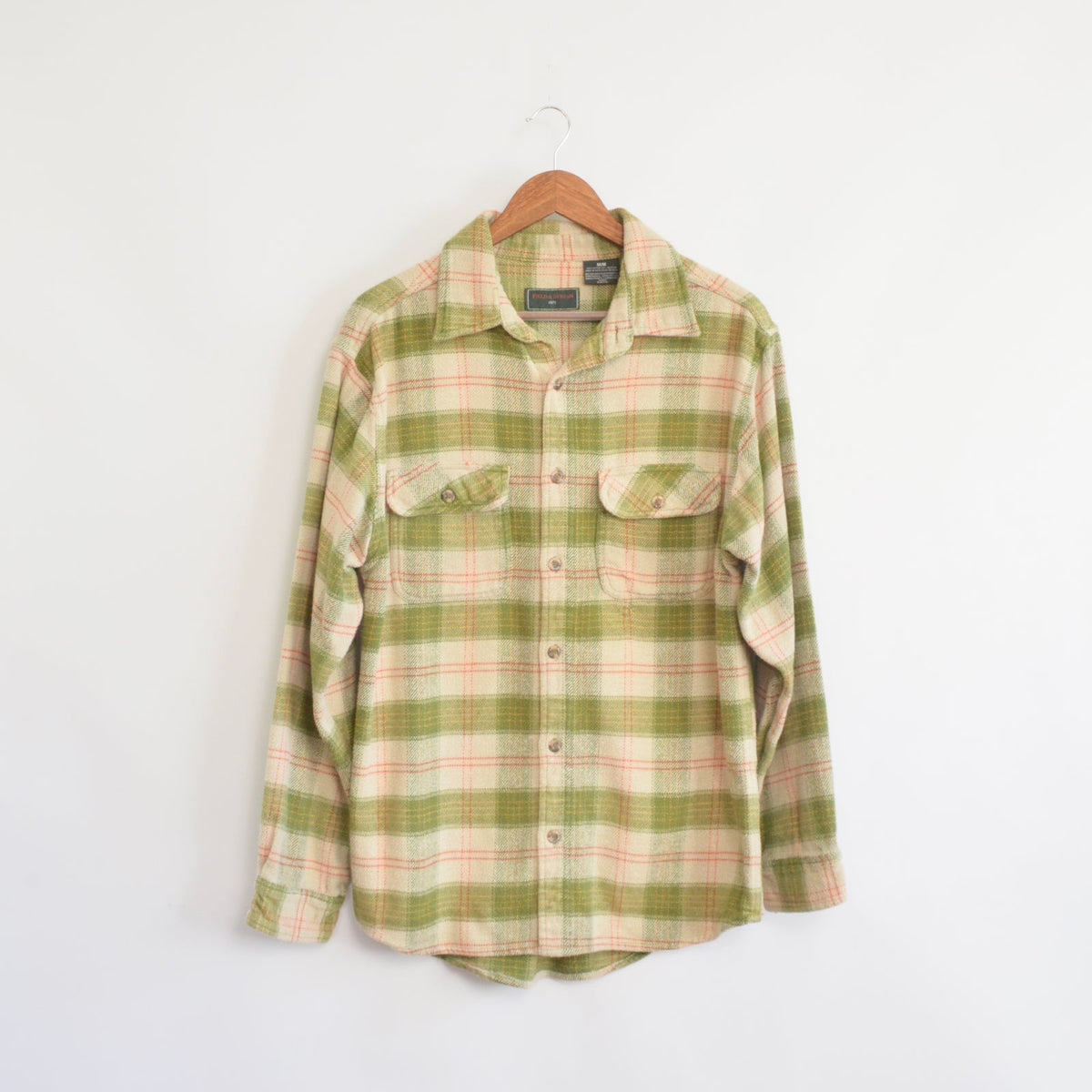 thick green field and stream flannel
