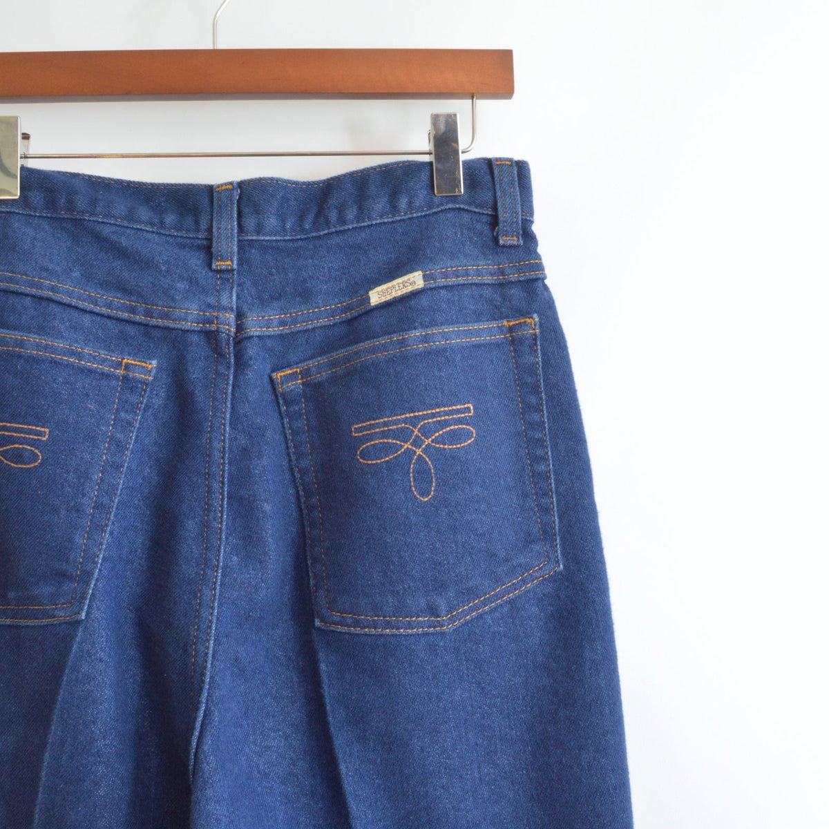 dark wash cowboy style high waisted seamed straight leg sheplers denim