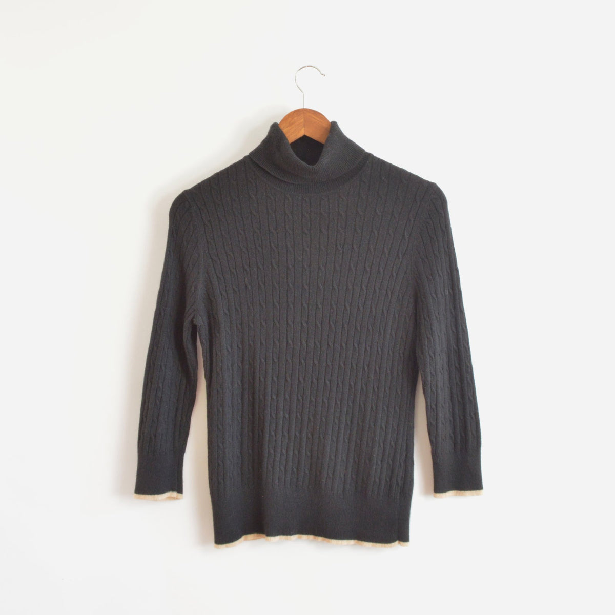 black cable knit cotton/cashmere/angora turtleneck with beige trim