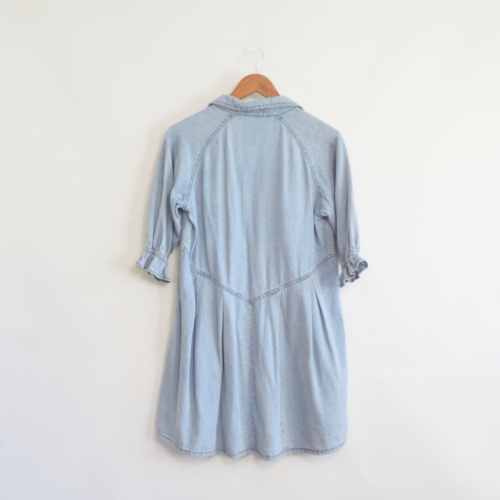 long sleeve light wash denim mini dress with western accents