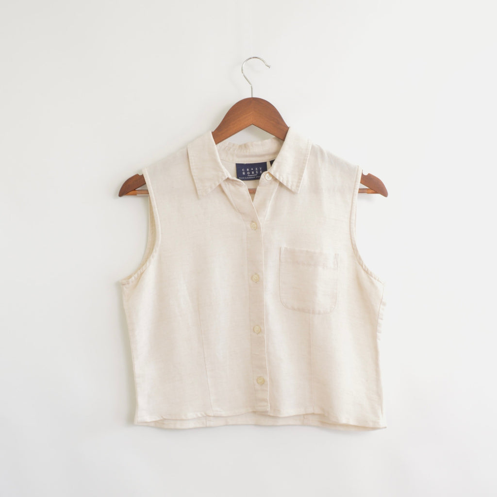 light blush tan cropped linen blend button down tank
