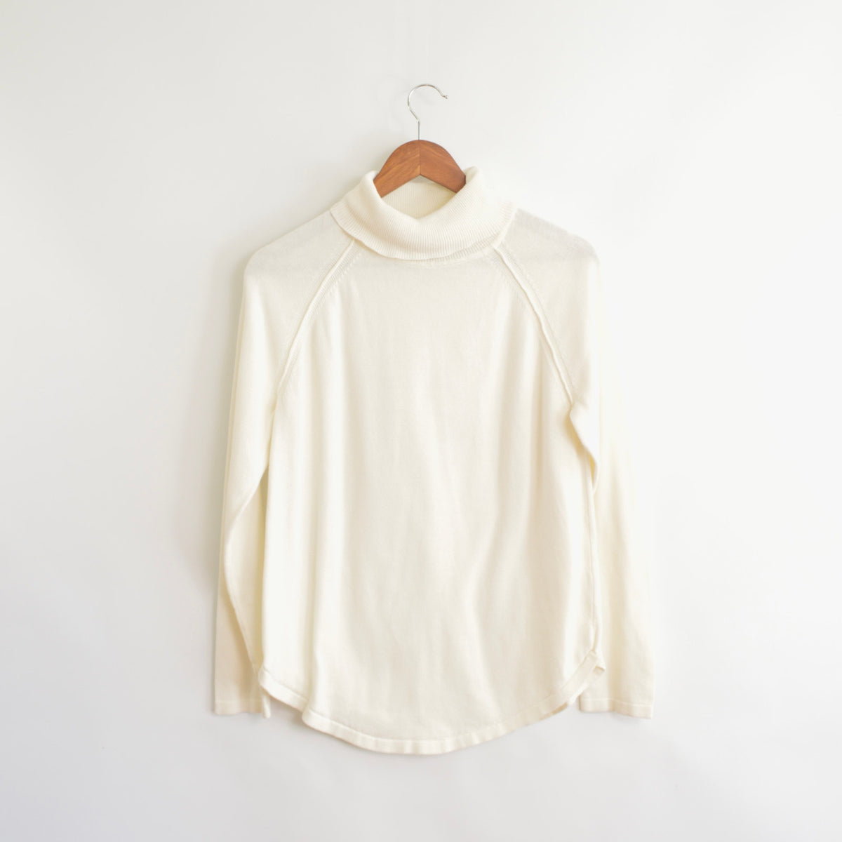 simple thin cream curved hem turtleneck sweater
