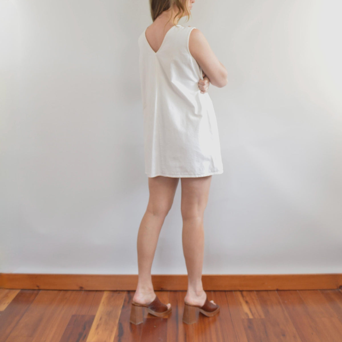 thick structured white denim mini dress